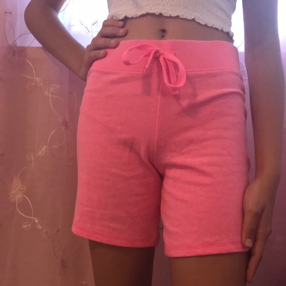 Long pink pink shorts.